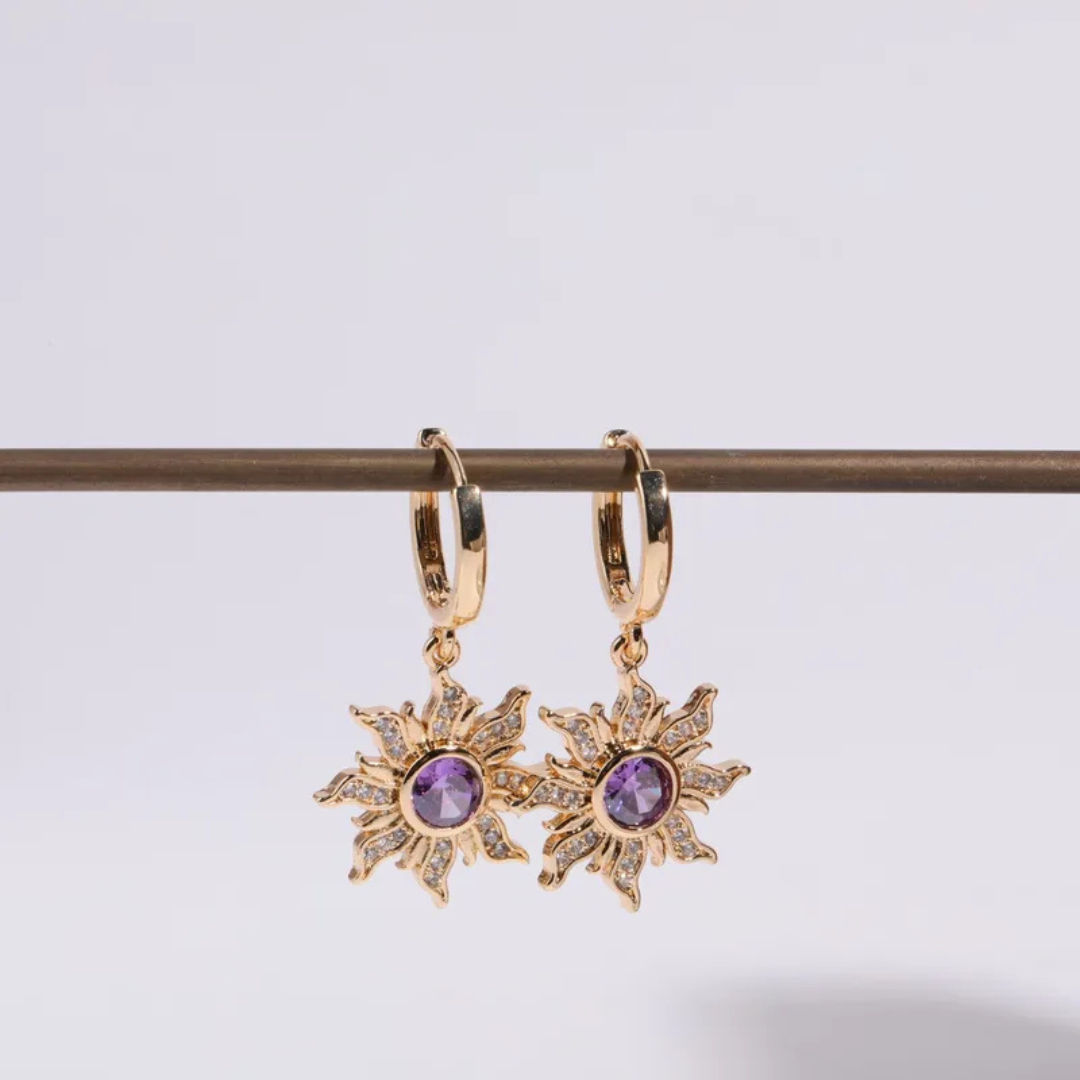 Aretes Dorados Enredados con sol morado