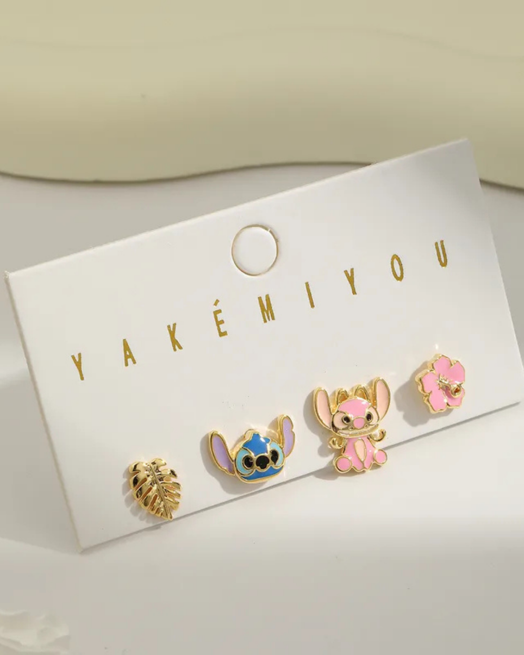 Aretes Stitch 4 pack (Stitch, Angel, hoja y Flor Rosada)