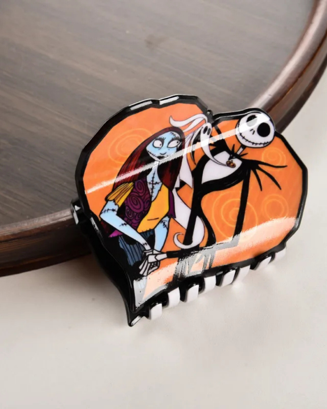 Prensa Cabello Jack y Sally fondo anaranjado