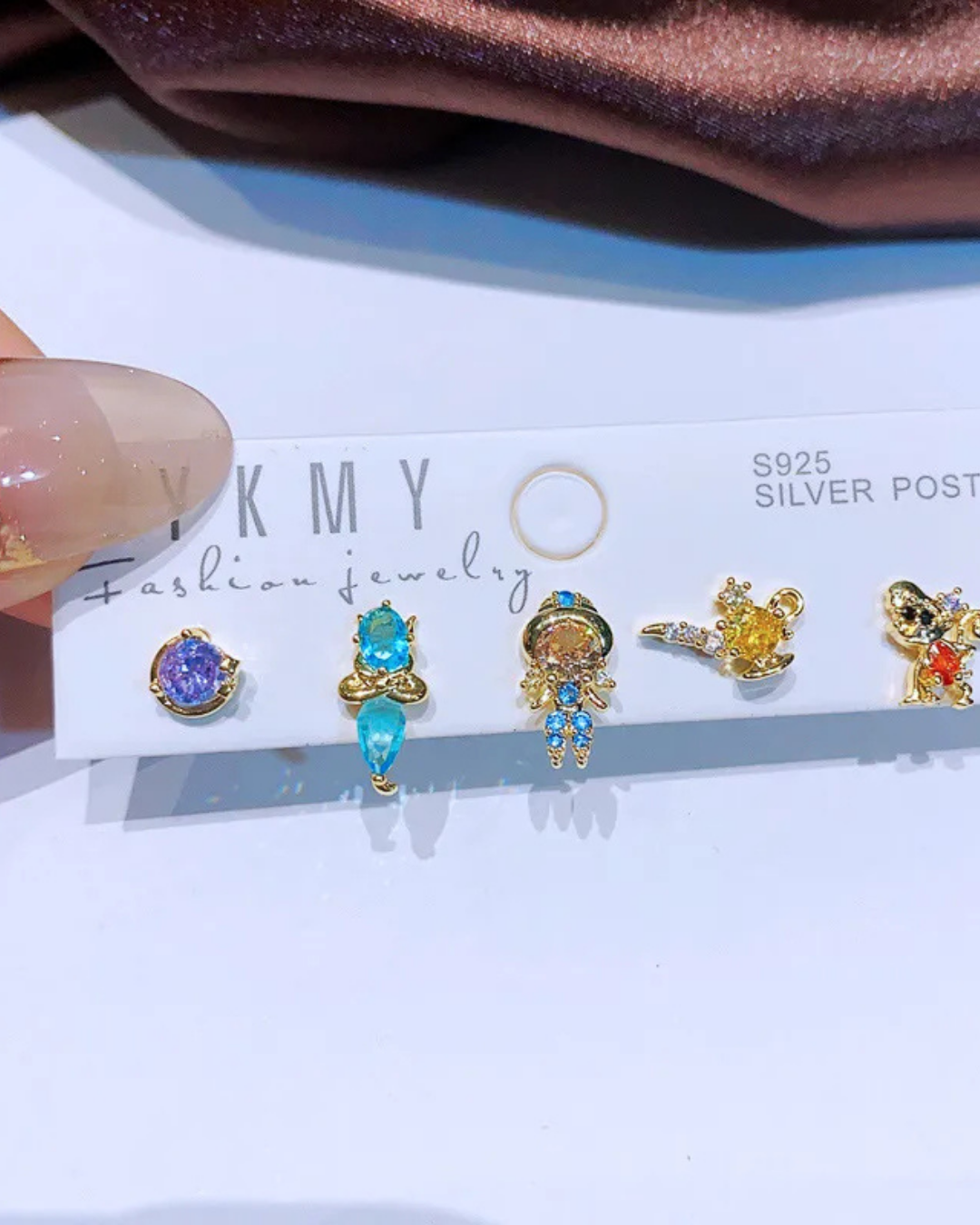 Aretes Aladín 5 pack (personajes diferentes, no colgantes)