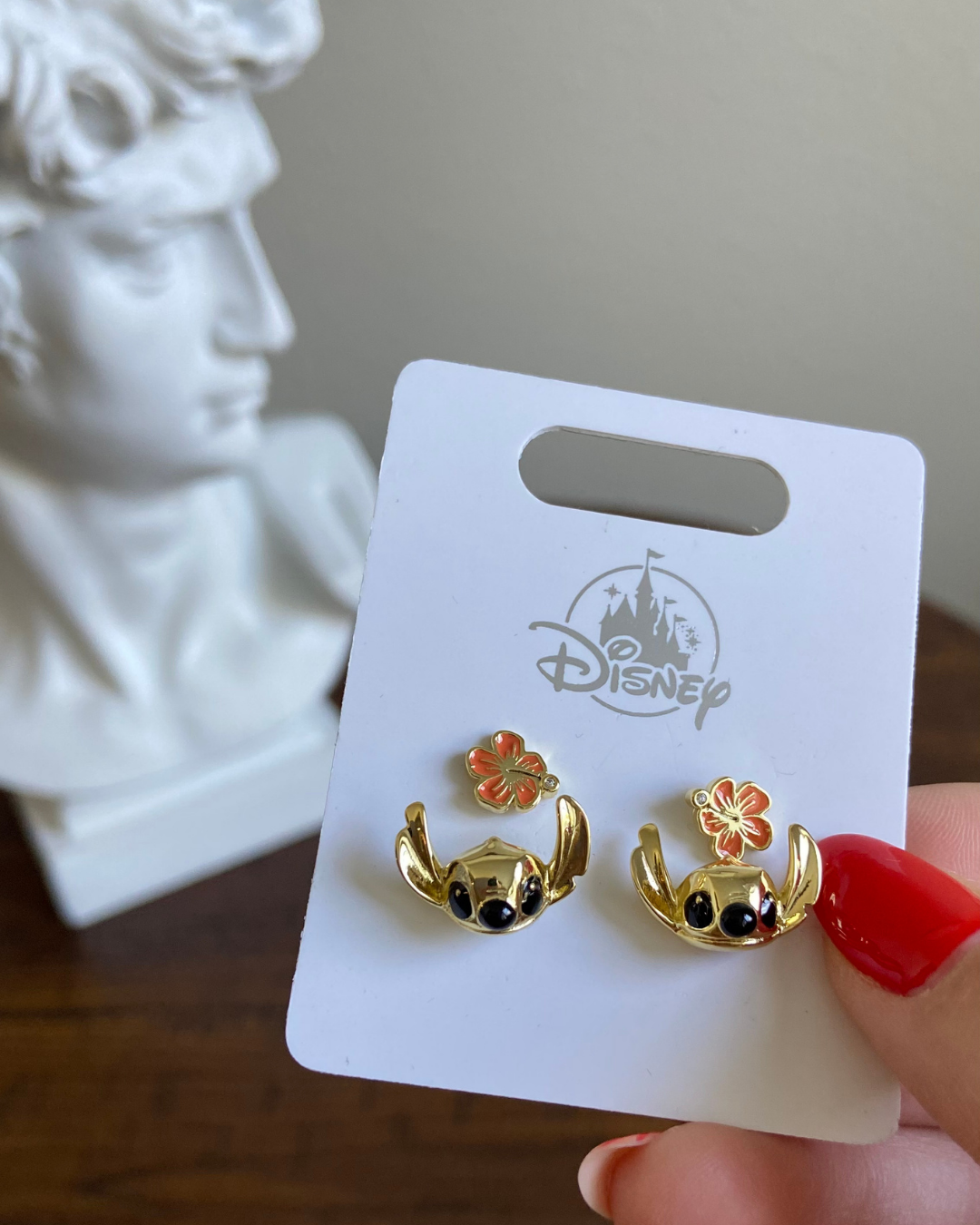 Set de Aretes Stitch + flores anaranjadas (2 pack)